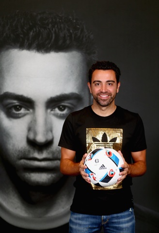 DUBAI, UNITED ARAB EMIRATES - NOVEMBER 23: Spanish football legend Xavi opens adidas zone in the new flagship Go-Sports Store in the Mall of Emirates Dubai. One of the greatest footballers of all time met with adidas competition winners and showcased his talents in adidas skills cage on November 23, 2015 in Dubai, United Arab Emirates. (Photo by Francois Nel/Getty Images for adidas) *** Local Caption *** Xavi